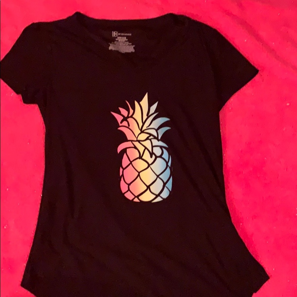 A black t-with pineapple on it